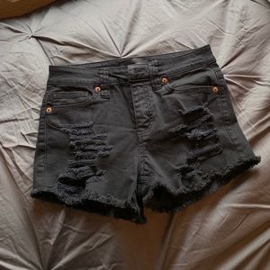 Black ripped shorts